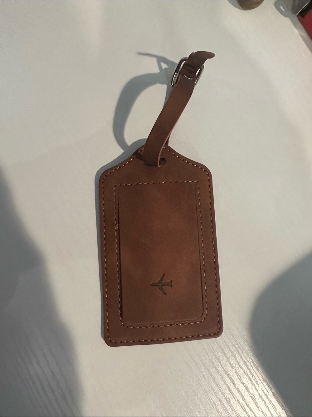 Brown Leather Luggage Tag with Airplane Accent